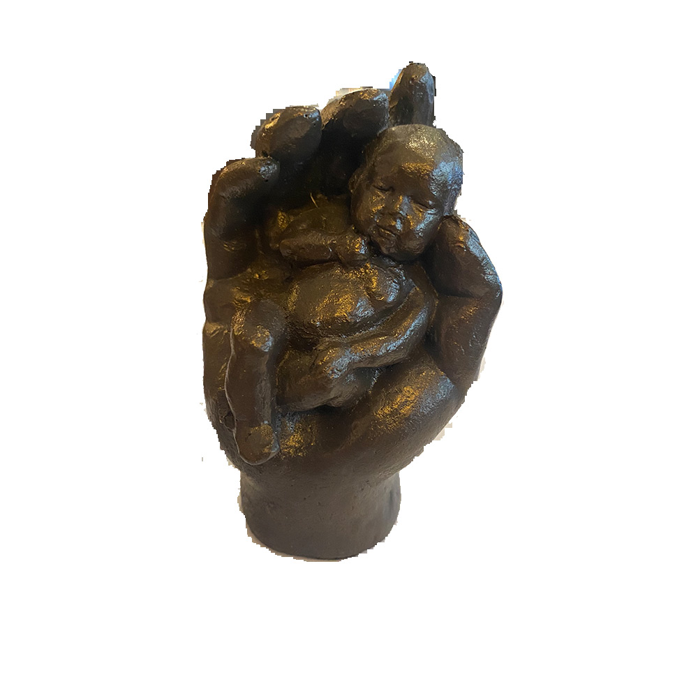 Beeld Staande hand met baby